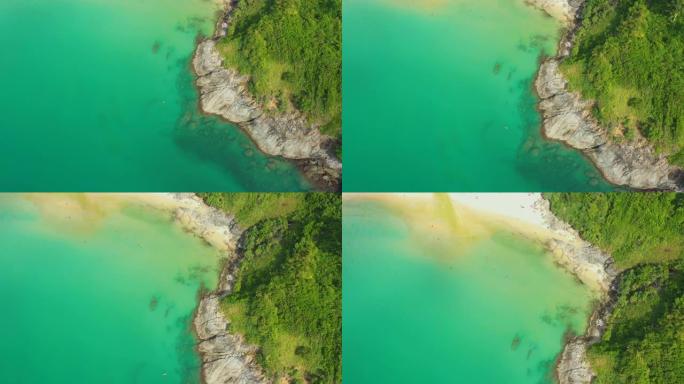 人们在普吉岛享受游泳和放松的海滩泰国巴东海滩是普吉岛一个非常著名的旅游目的地4k鸟瞰图无人机自上而下