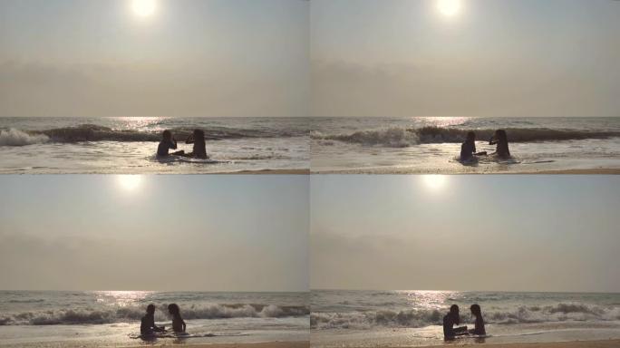 场景慢动作的兄弟姐妹亚洲人在夏天在海滩上快乐，他们在假期，放松的时刻很开心。儿童自然户外日常生活的概