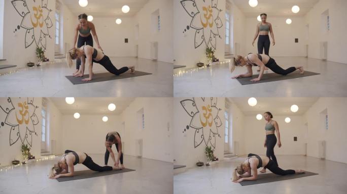 瑜伽工作室私人教练的私人瑜伽课的慢动作视频