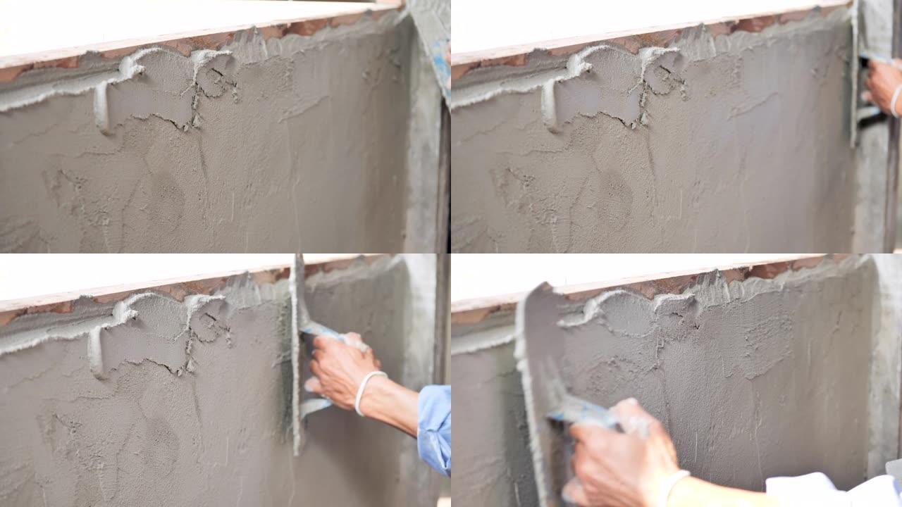 建筑工人石膏水泥墙