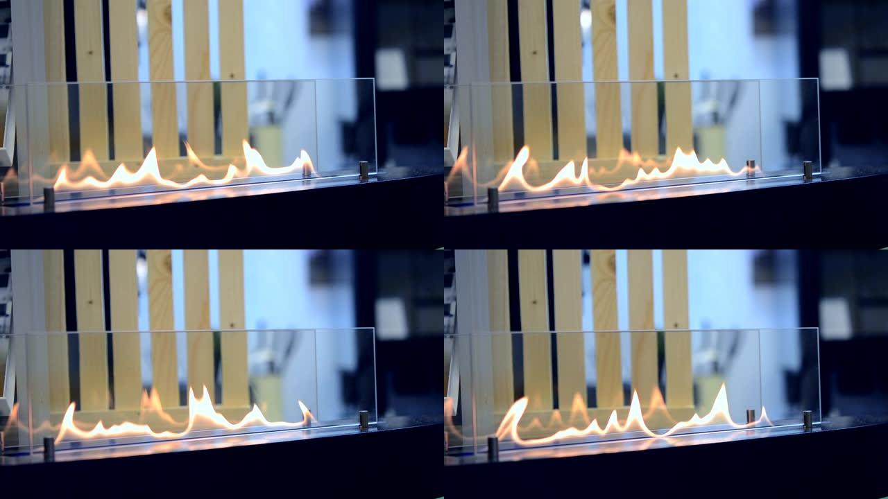 一个生物壁炉燃烧乙醇气体。当代生物燃料在乙醇火场壁炉特写。