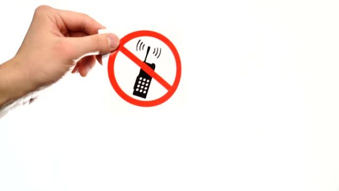 在白色上显示警告标志 “No phone” 的手