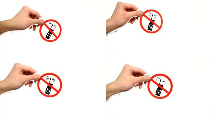 在白色上显示警告标志 “No phone” 的手
