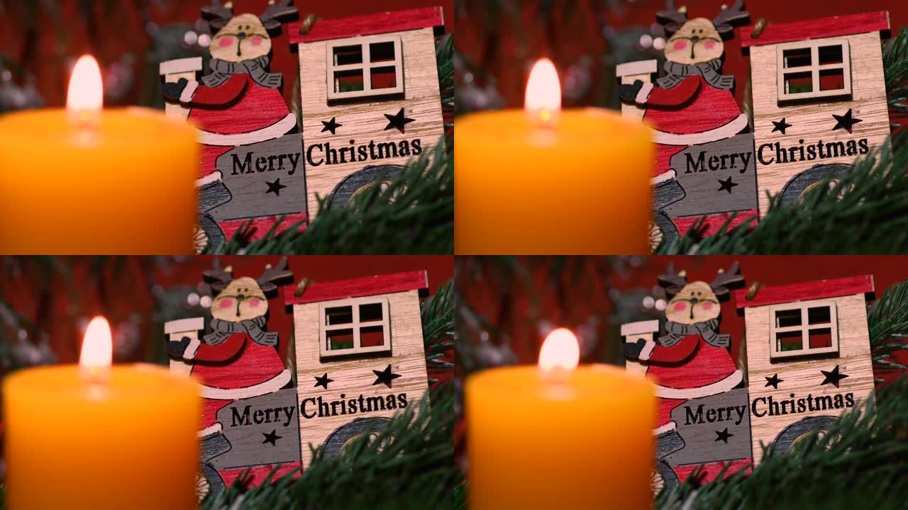 蜡烛上有绿色冷杉和波克灯的圣诞装饰品。圣诞气氛。