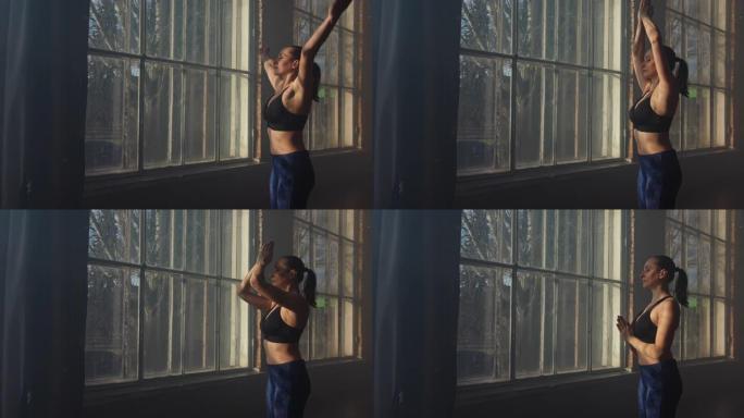 健身瑜伽女人锻炼健康的生活方式在健身室瑜伽合十礼姿势苏利亚那马斯卡尔体式