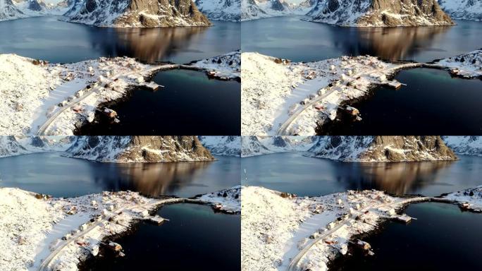 罗弗滕群岛挪威海海岸线上积雪的斯堪的纳维亚渔村