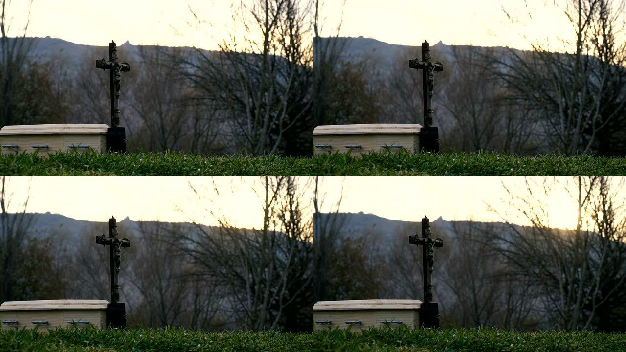日落时的墓地祈祷花圈宗教事件