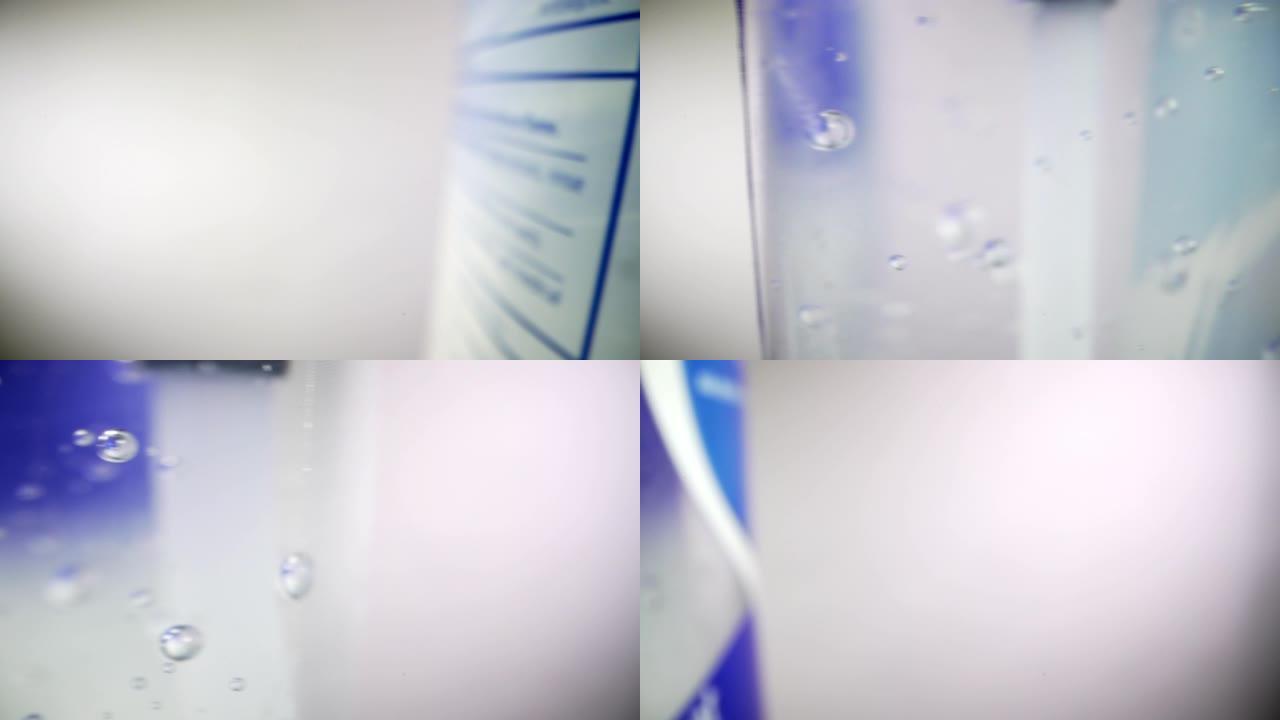 移动相机跟踪超宏观特写镜头酒精和芦荟凝胶洗手液中气泡的镜头防止COVID传染性非典型肺炎nCoV 1