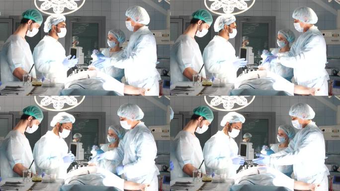 熟练的外科医生在手术过程中使用手术刀和夹子