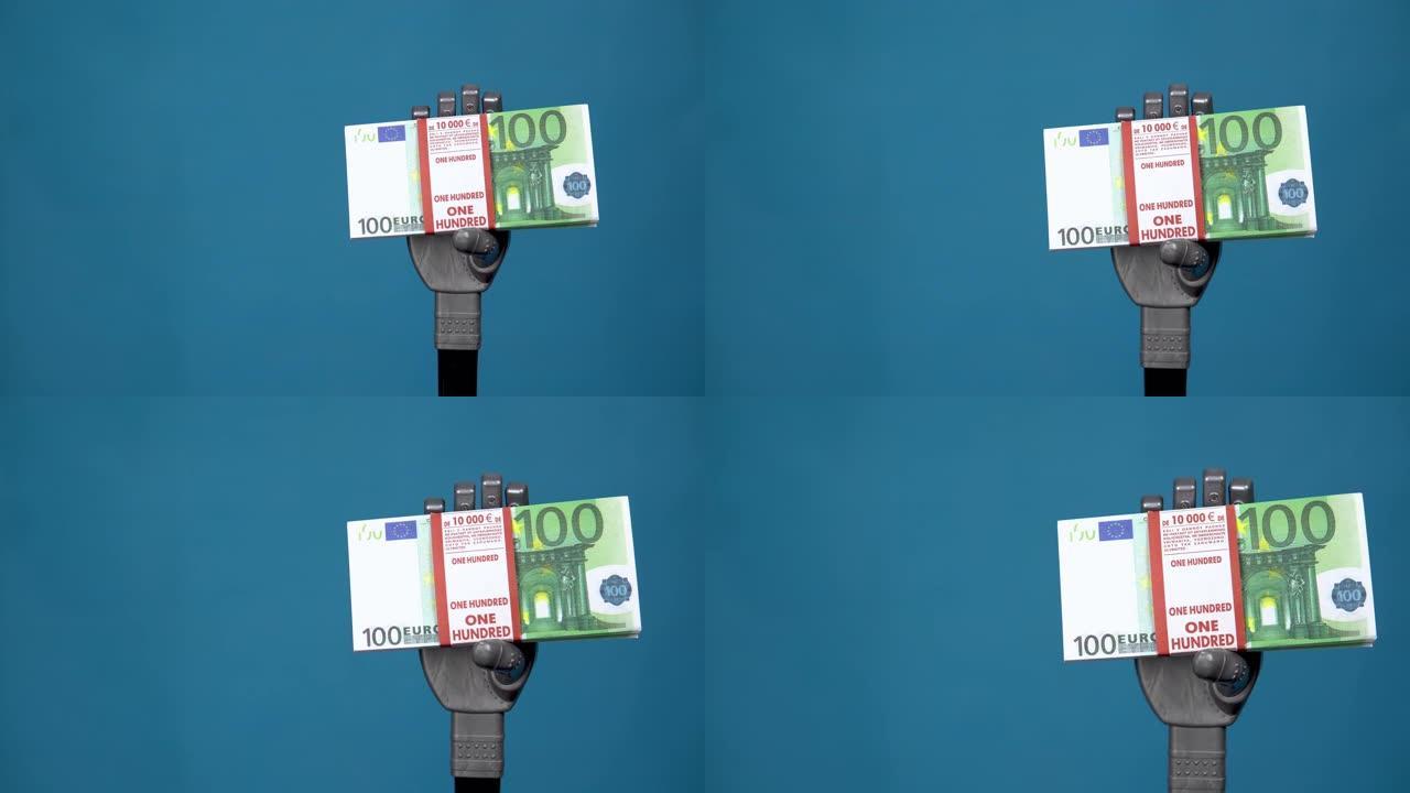 一只机械手拿着一捆欧元。灰色的半机械手在蓝色背景上拿着钱。4k