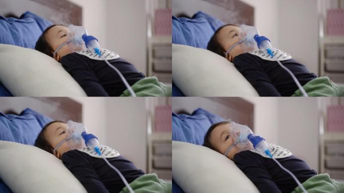 一个可爱的小男孩躺在床上的4k镜头