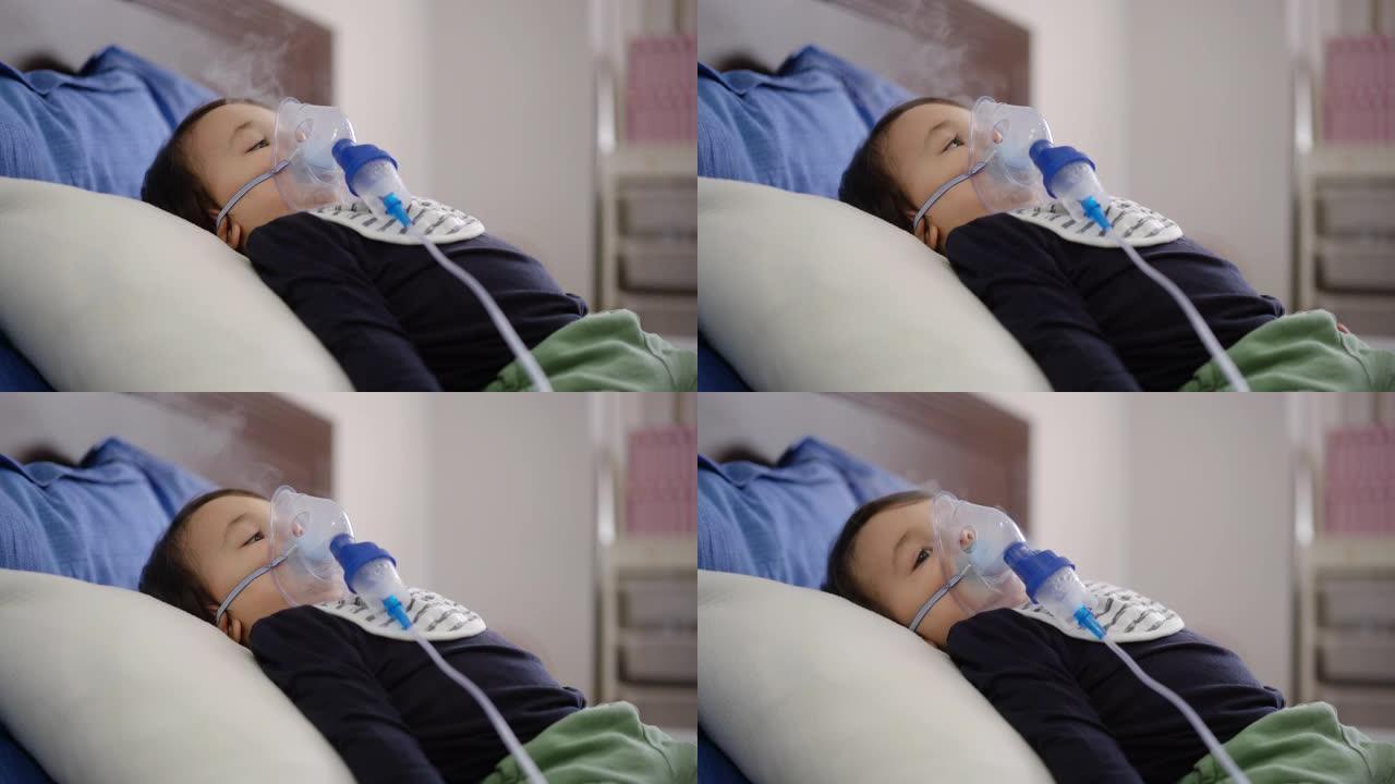 一个可爱的小男孩躺在床上的4k镜头
