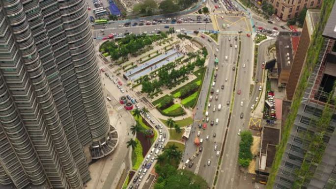吉隆坡城市日时间市中心交通街十字路口空中俯冲全景4k马来西亚