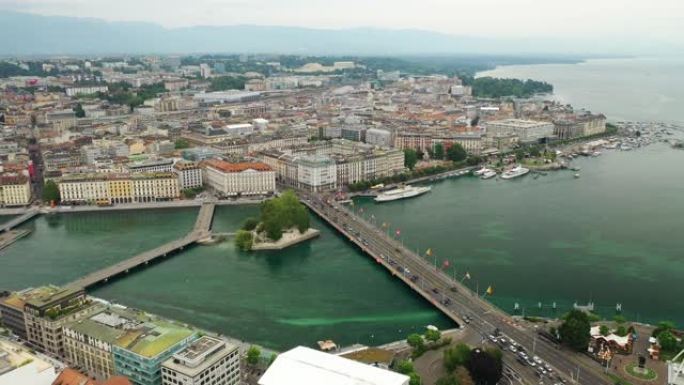 阴天日内瓦市著名的中央滨河湖交通桥空中全景4k瑞士