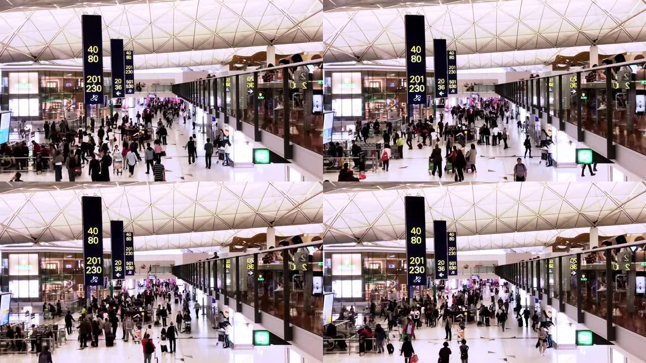 4k时间流逝: 拥挤的乘客在香港机场航站楼行走