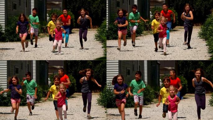 一群快乐的孩子在路上奔跑