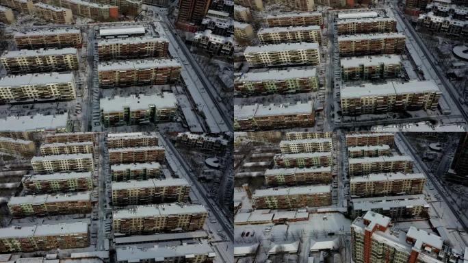 下雪后俯瞰住宅区积雪覆盖无人机俯视屋顶