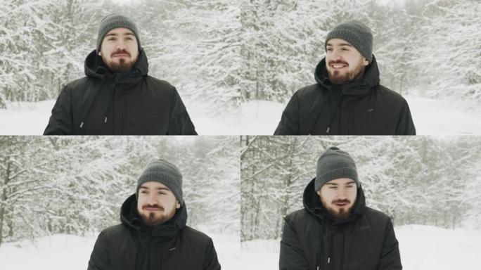 男子在冬季森林中漫步视频