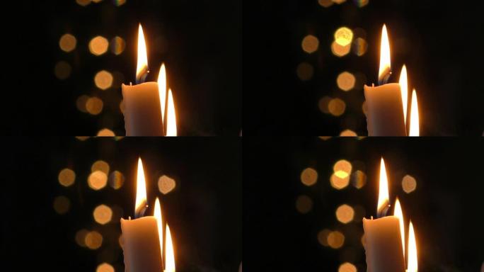 假日蜡烛在黑暗中燃烧。