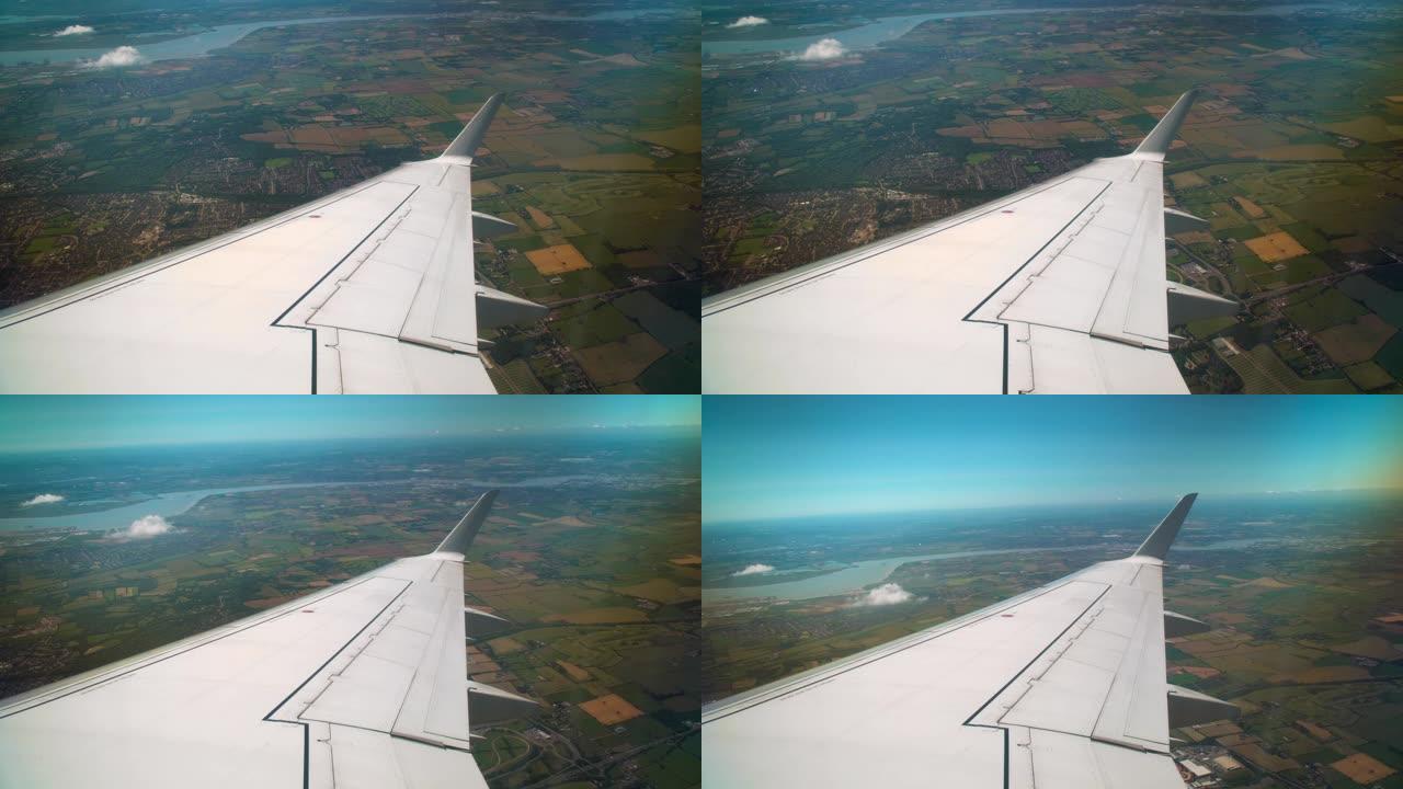 从飞机上看飞机机翼飞机起飞飞机窗外风景