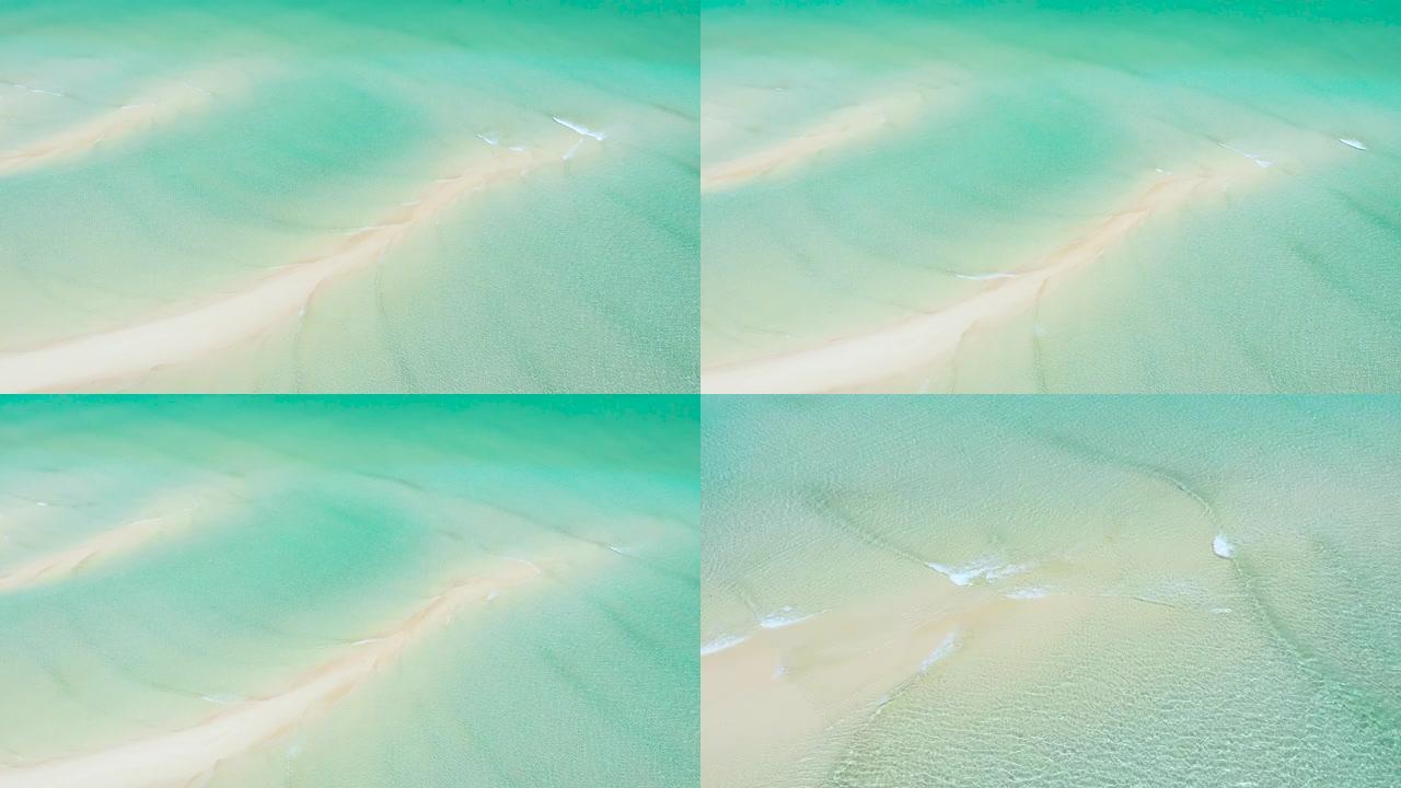 太平洋旅游浅水区沙洲的航拍镜头。乌韦亚岛，新喀里多尼亚旅游。