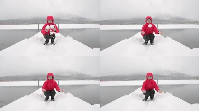 女人在朱砂湖扔雪球
