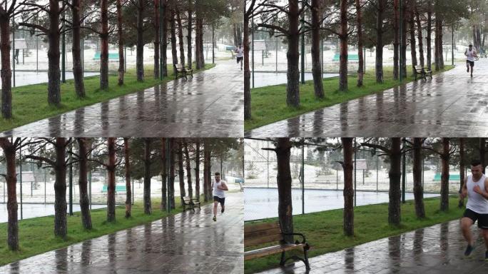 年轻的运动员在雨中锻炼