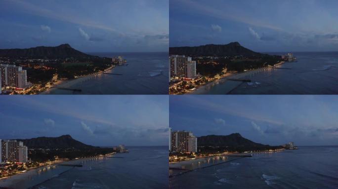从无人驾驶飞机悬停在酒店上方时，从檀香山威基基海滩的鸟瞰图