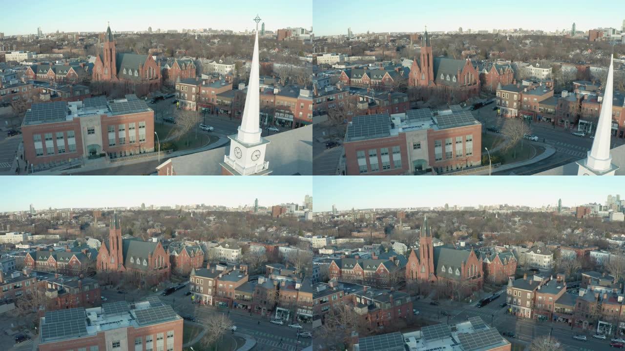 平滑的空中无人机拍摄了波士顿郊区的几个教堂尖顶
