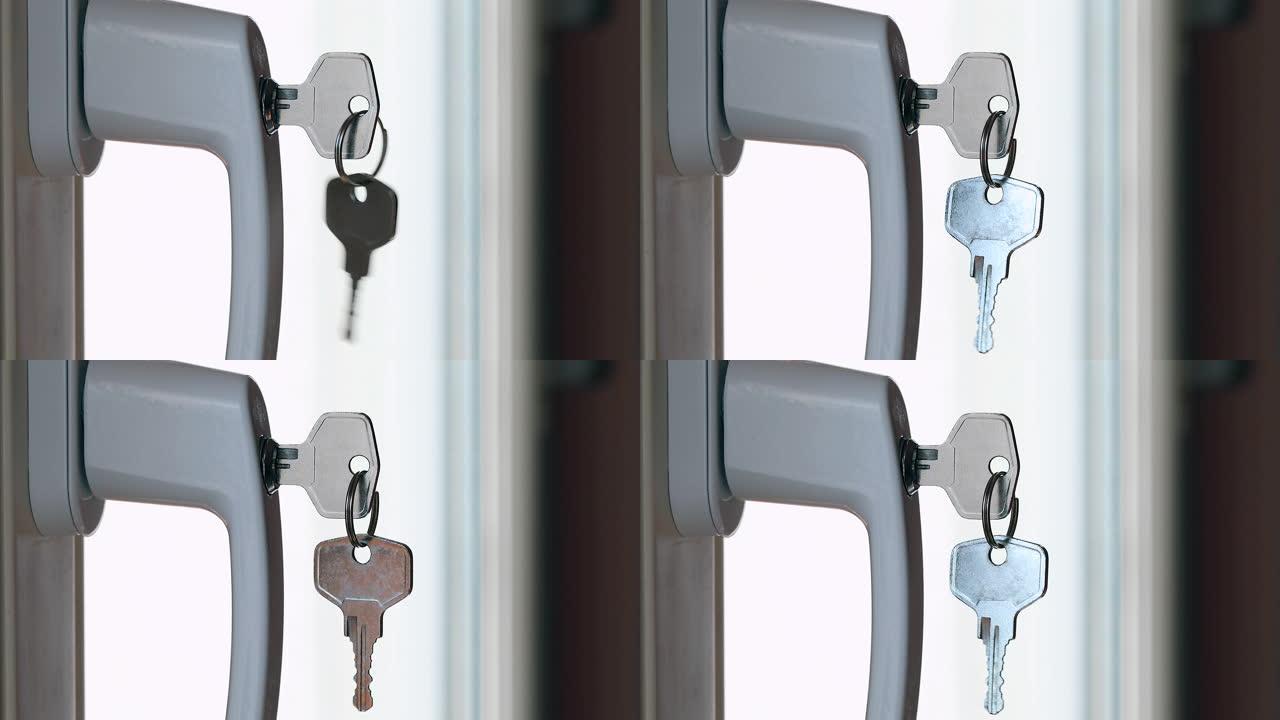 一个男人的手在安全的窗户把手上转动钥匙
