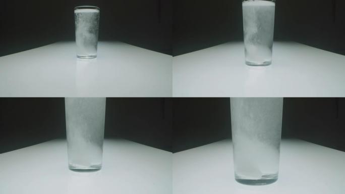 泡腾片溶解在一杯水中