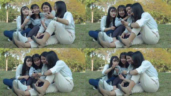 亚洲女子在公园聊天