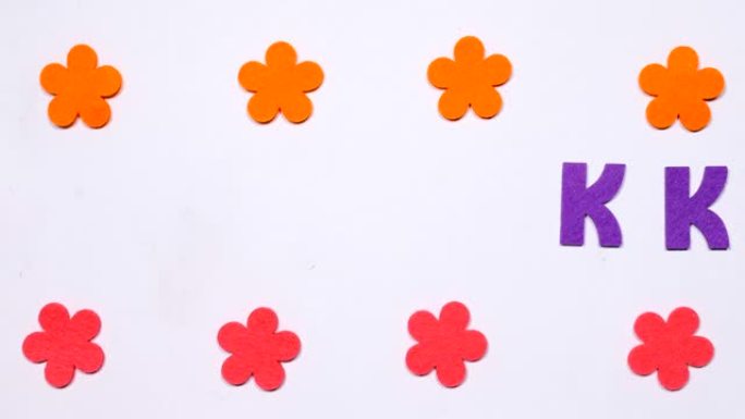 英文字母的紫色舞动字母K。