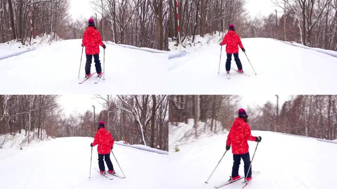 滑雪穿着红色衣服滑雪地面积雪滑雪场地