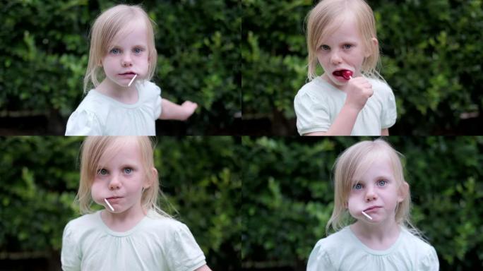 一个金发女孩吃棒棒糖的肖像