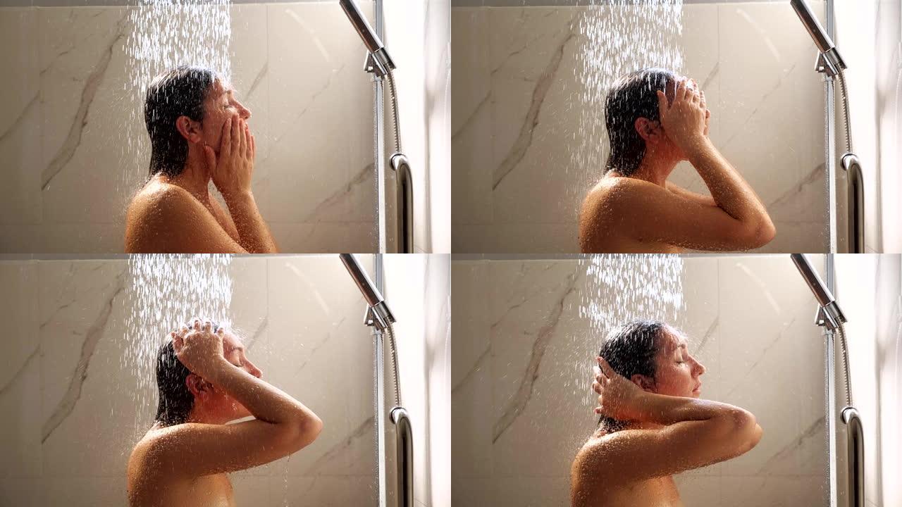 慢镜头里的女人正在洗澡。