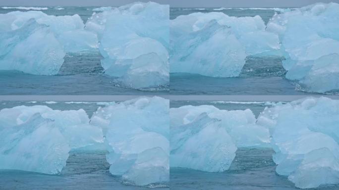 融化北极冰蓝水冰山。