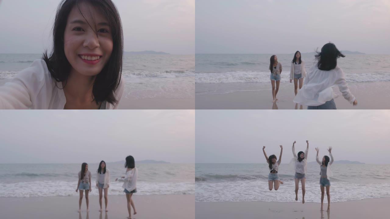 自拍相机倒计时定时器与朋友组年轻女性跳跃快照准备设置三脚架在夏季海滩旅行，快乐的人们生活方式活动