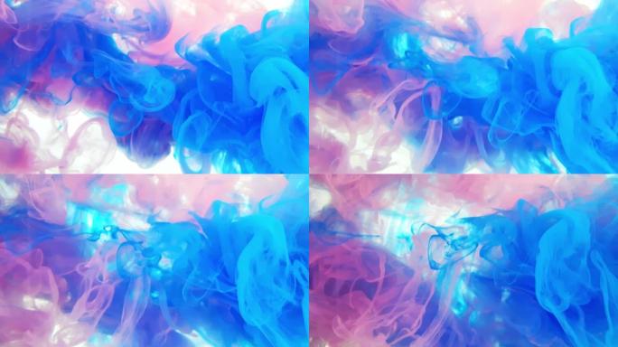 丙烯酸油墨在水中的美丽混合物。蓝色和粉红色的墨水混合时形成抽象的云。白色背景上的丙烯酸云。慢动作