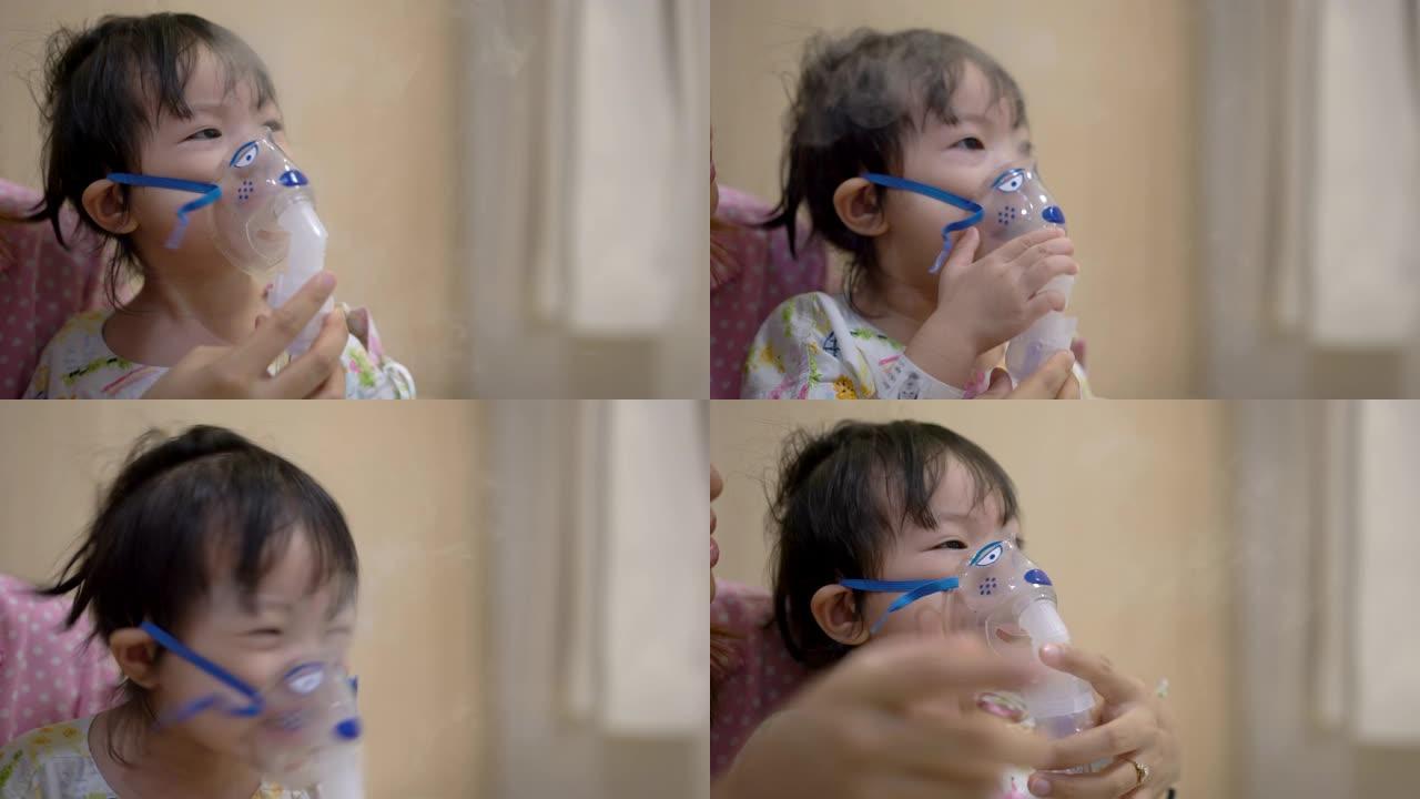 亚洲小女孩在医院用雾化器进行药物吸入治疗，小女孩拒绝戴雾化器。手持镜头和现实生活。