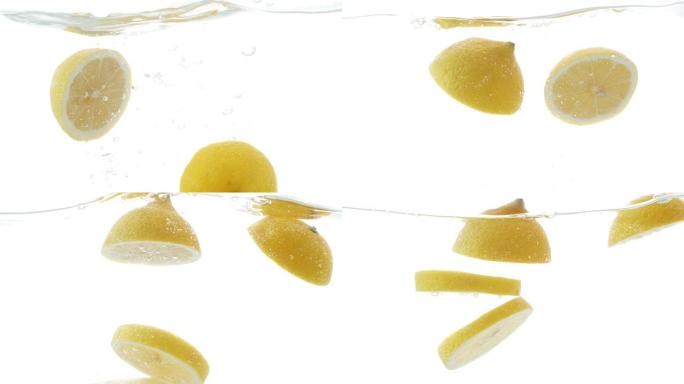 切成薄片的柠檬掉入水中的慢动作视频