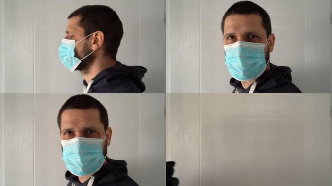 白人男子成人特写肖像戴着抗病毒细菌污染防护面具拍摄前视疾病威胁走进外面看相机