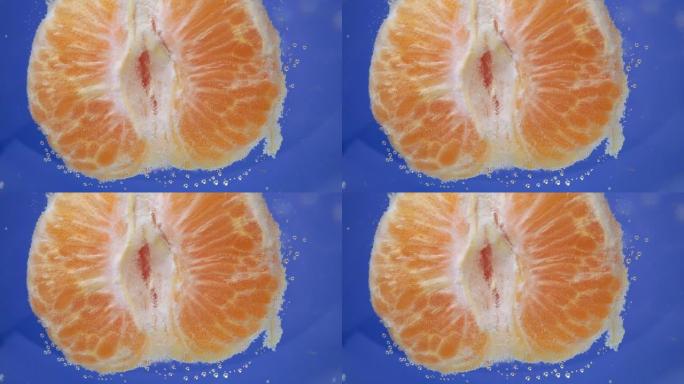 橘子柑橘，橘皮或柑橘片。水下新鲜柑橘类水果。