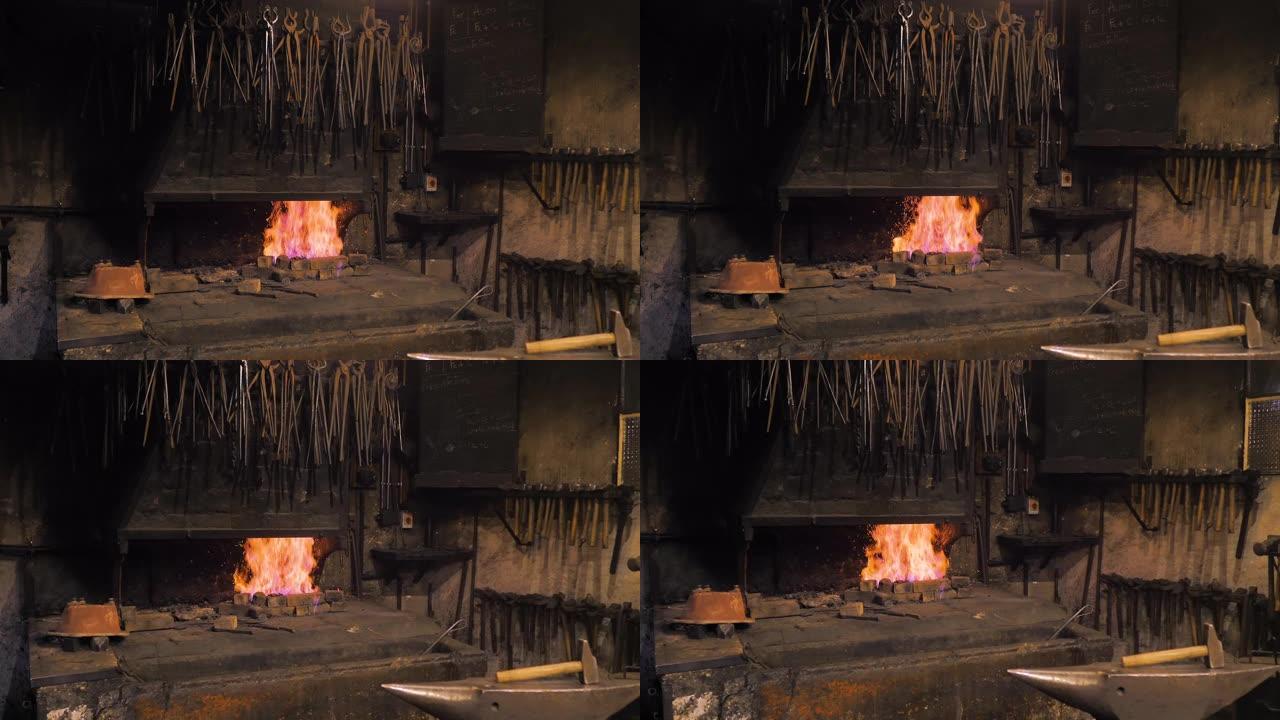 在anunque和锁匠的锤子旁边点燃了火的黑暗锻造