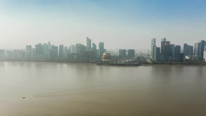 阳光明媚的日子杭州市中心景观滨河湾空中延时全景4k中国