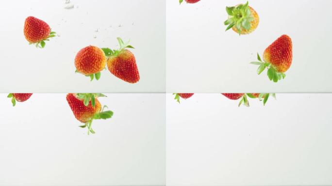 3草莓从白色背景的角度溅入水中