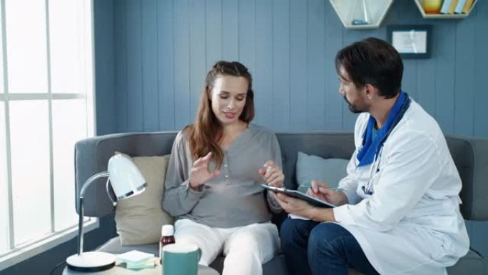 特写孕妇在医院和医生谈话。怀孕保健