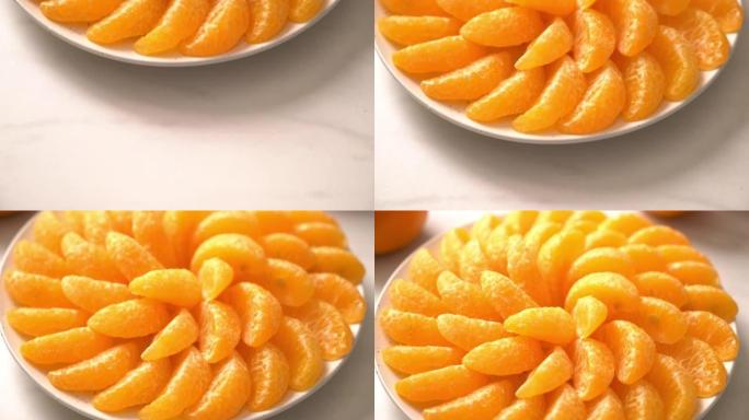 盘子上的新鲜橘子-健康概念