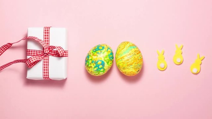 复活节概念。鸡蛋和礼物从上面