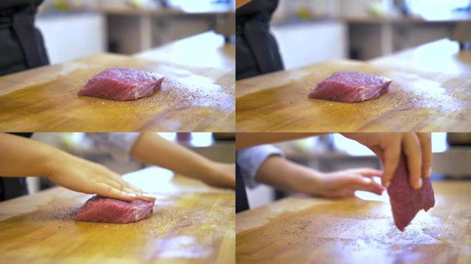 一块新鲜的肉是胡椒粉放在木桌上